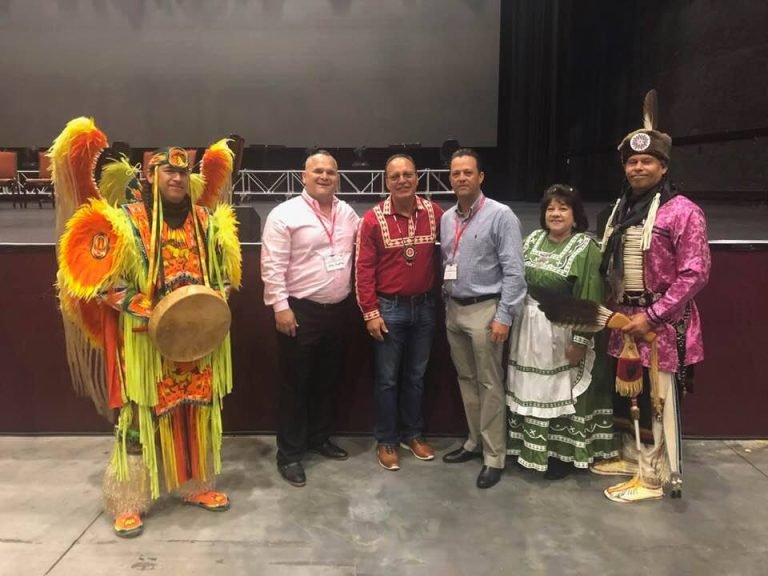 Pictured: Randy Anoatubby (Anoatubby Consultants), Chief Gary Batton of the Choctaw Nation and Shane Pratt (Owner of Phoenix Tribal Restorations) with dancers.